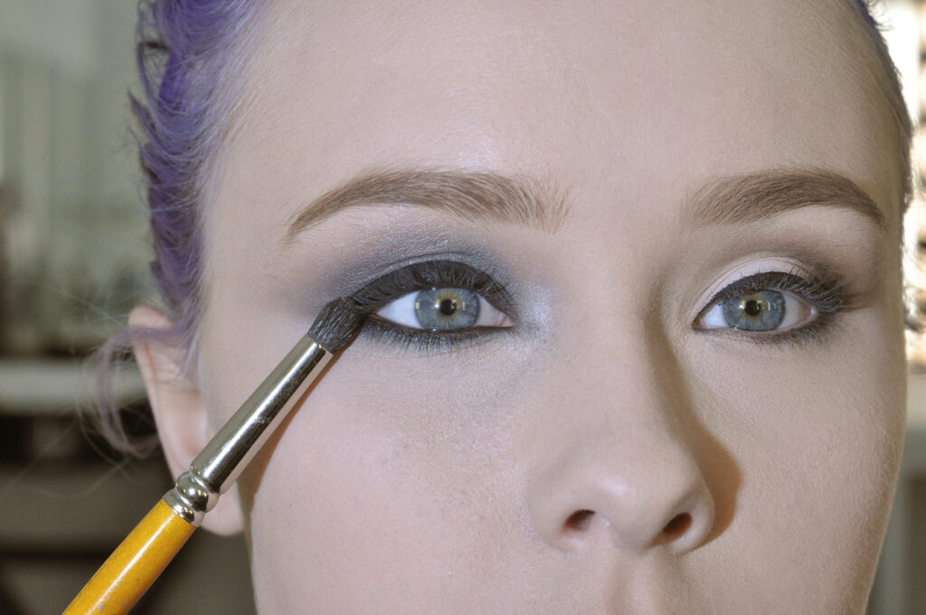 close up of model during makeup education class by Jasmine Ringo