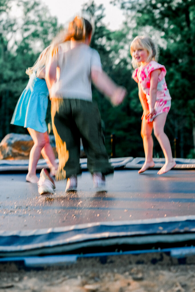 kids running and jumping on trampoline
