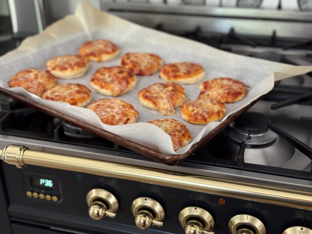 mini cheese pizzas fresh out the oven